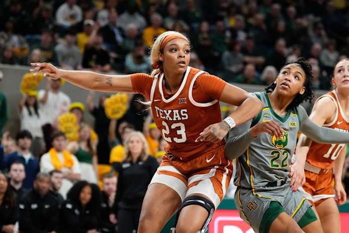Feb 1, 2024; Waco, Texas, USA; Texas Longhorns forward Aaliyah Moore (23) and Baylor Lady Bears guard Bella Fontleroy (22) battle for position during the second half at Paul and Alejandra Foster Pavilion.